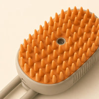 Close-up of the soft silicone bristle plate and steam nozzle